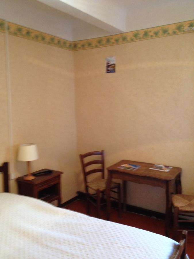 Bar Hotel De La Place Mezel Luaran gambar